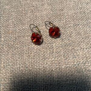 Sabika earrings burnt orange or rusted color.